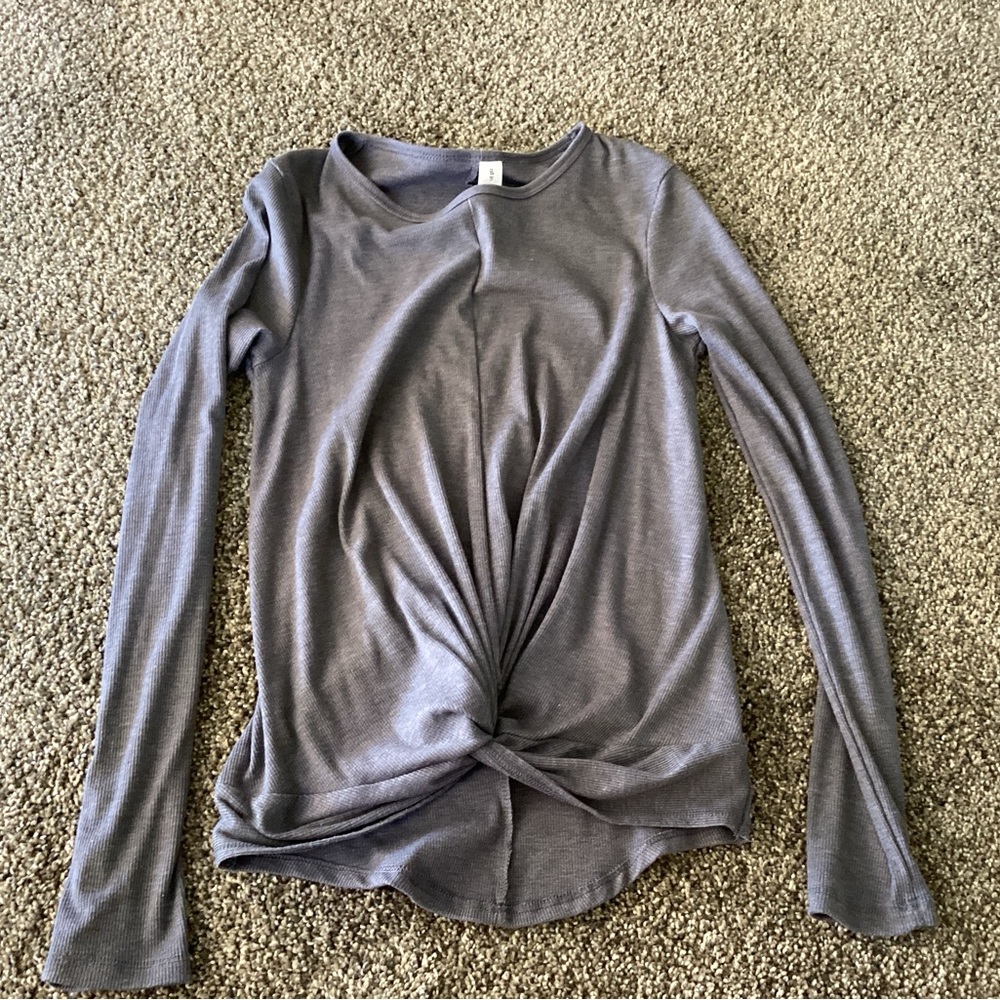 Ribbed long sleeve top with front twist